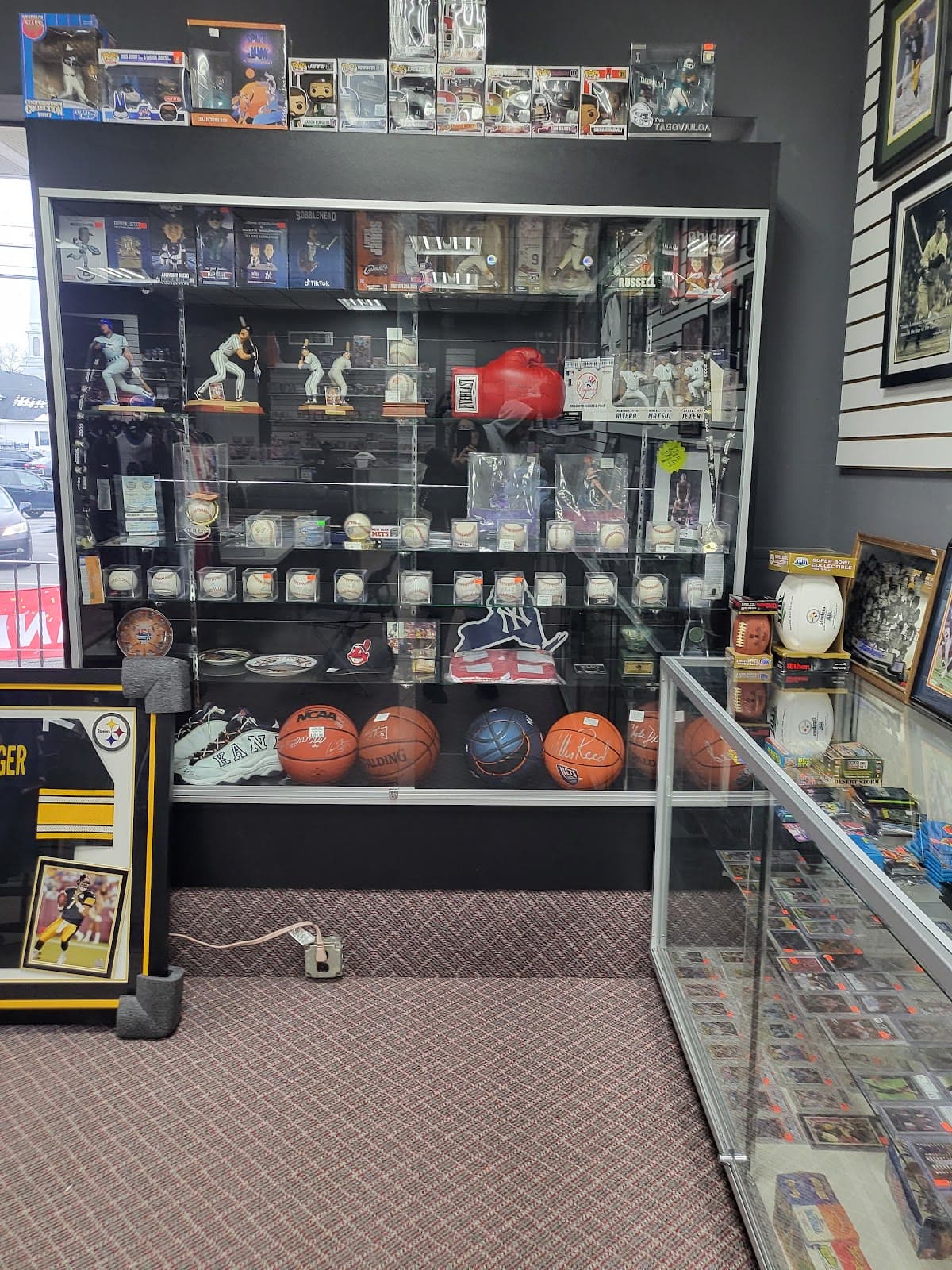 Signed balls and sports memorabilia in the shop